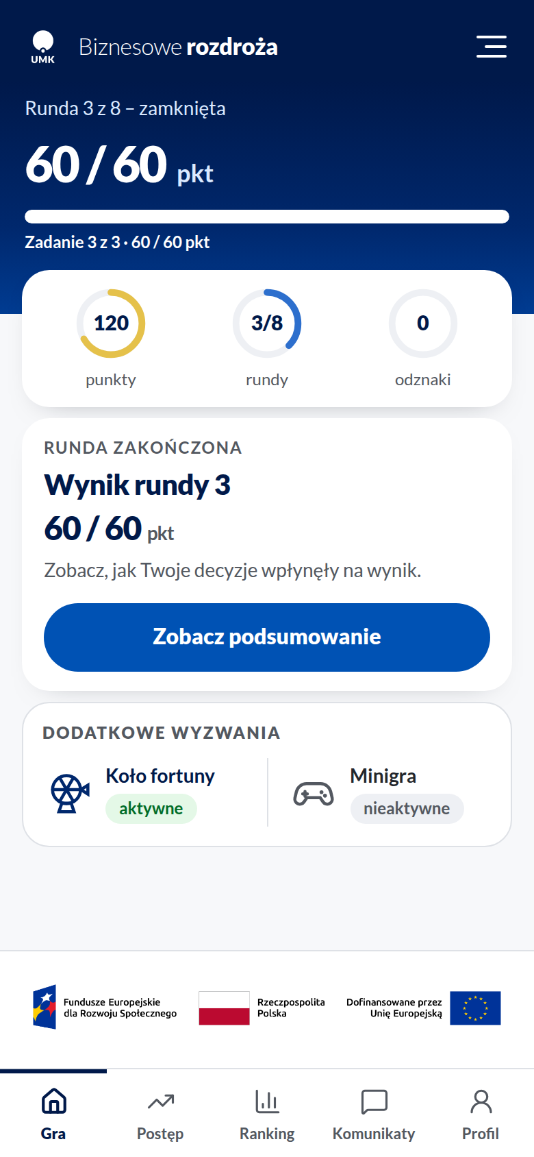 Ekran główny po zamknięciu rundy, z aktywnym kołem fortuny